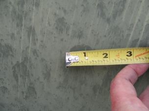 Measured Hail Stone Mark On Property